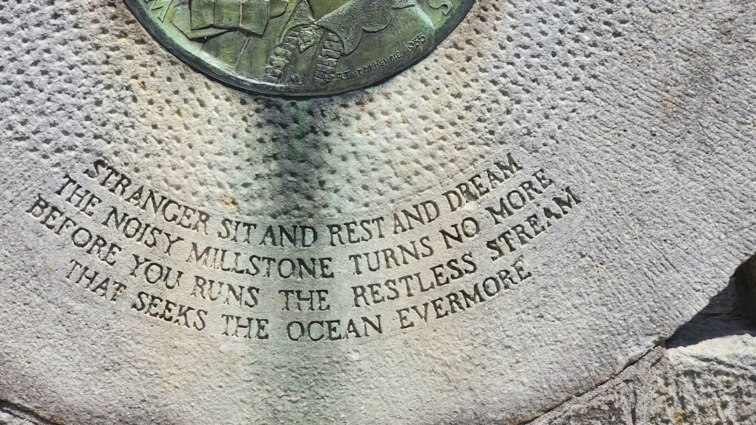 A close up of a stone with writing on it