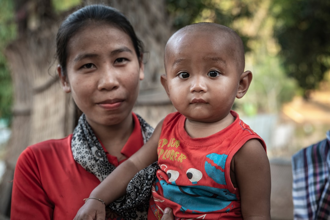 woman holding toddler