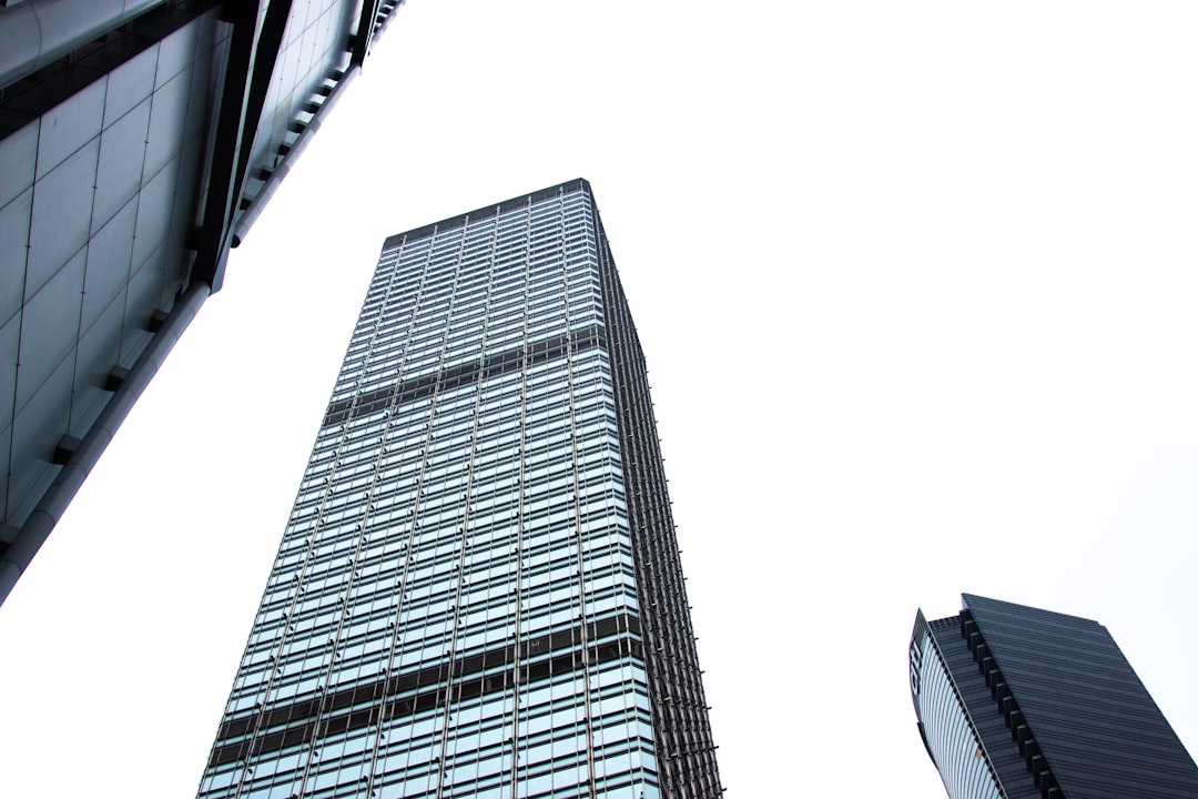 grayscale photo of high rise building